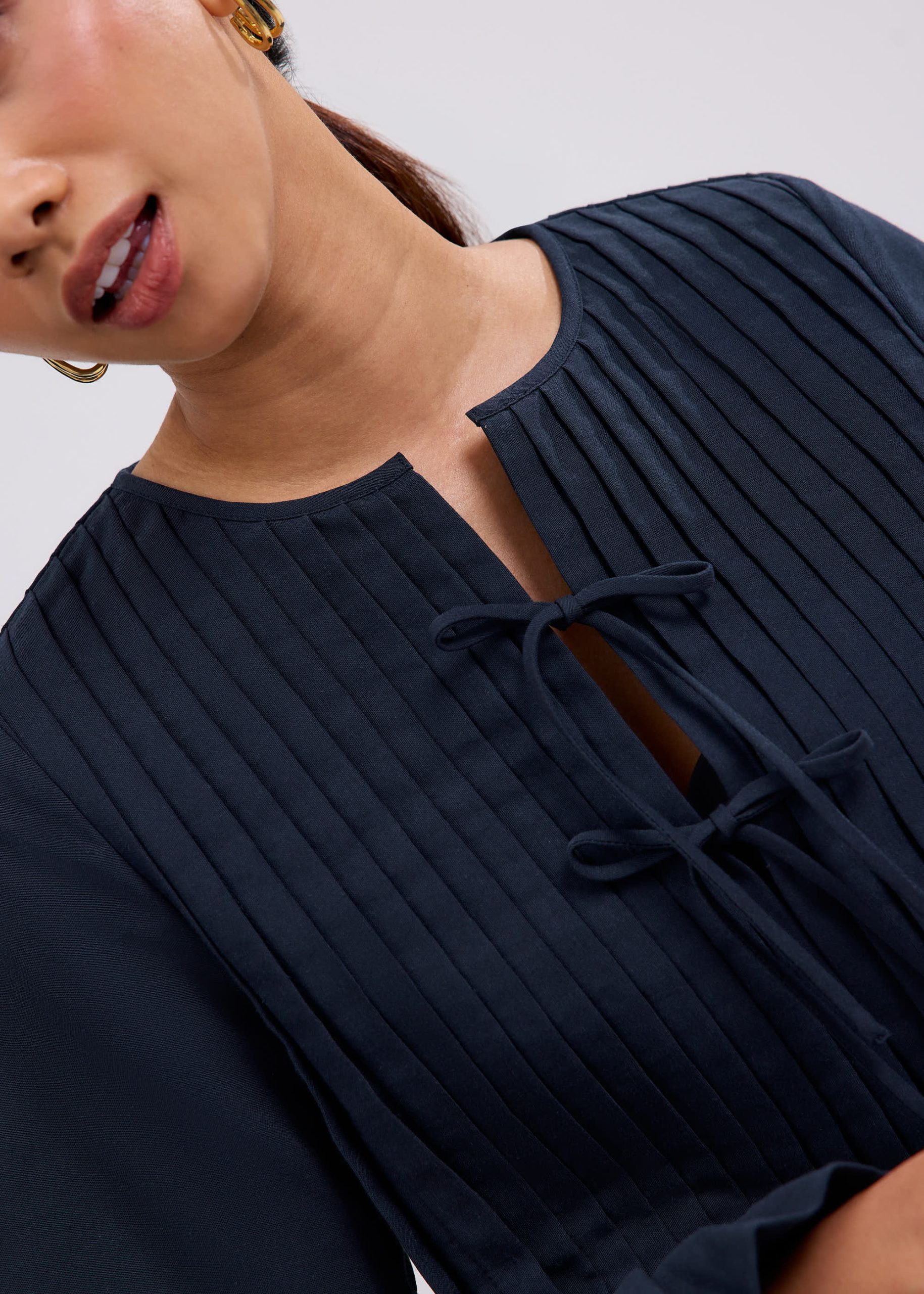 Oxford Pintuck Notched Peplum Top - Image 10